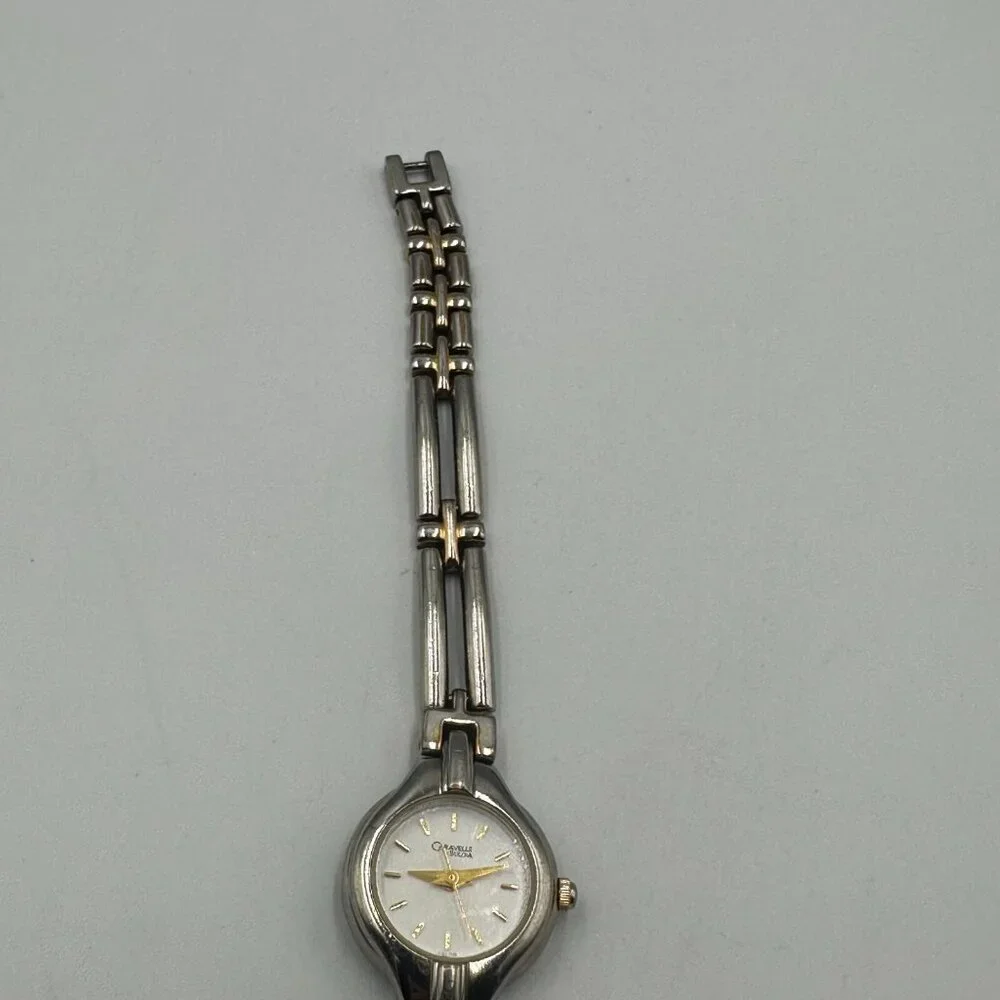 Caravelle by Bulova Watch Women Silver Gold Two Tone Small Dial 20MM New Battery